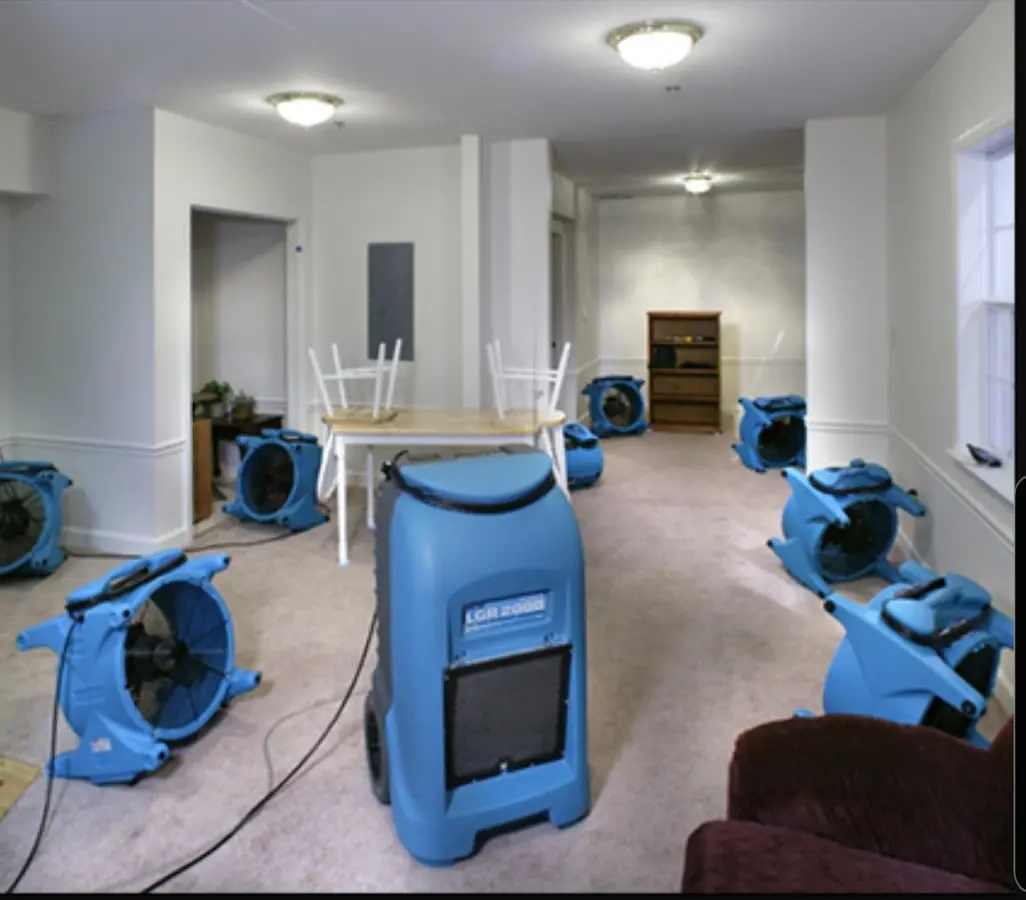 Air movers and dehumidifier setup for Water Damage Restoration in Ashland